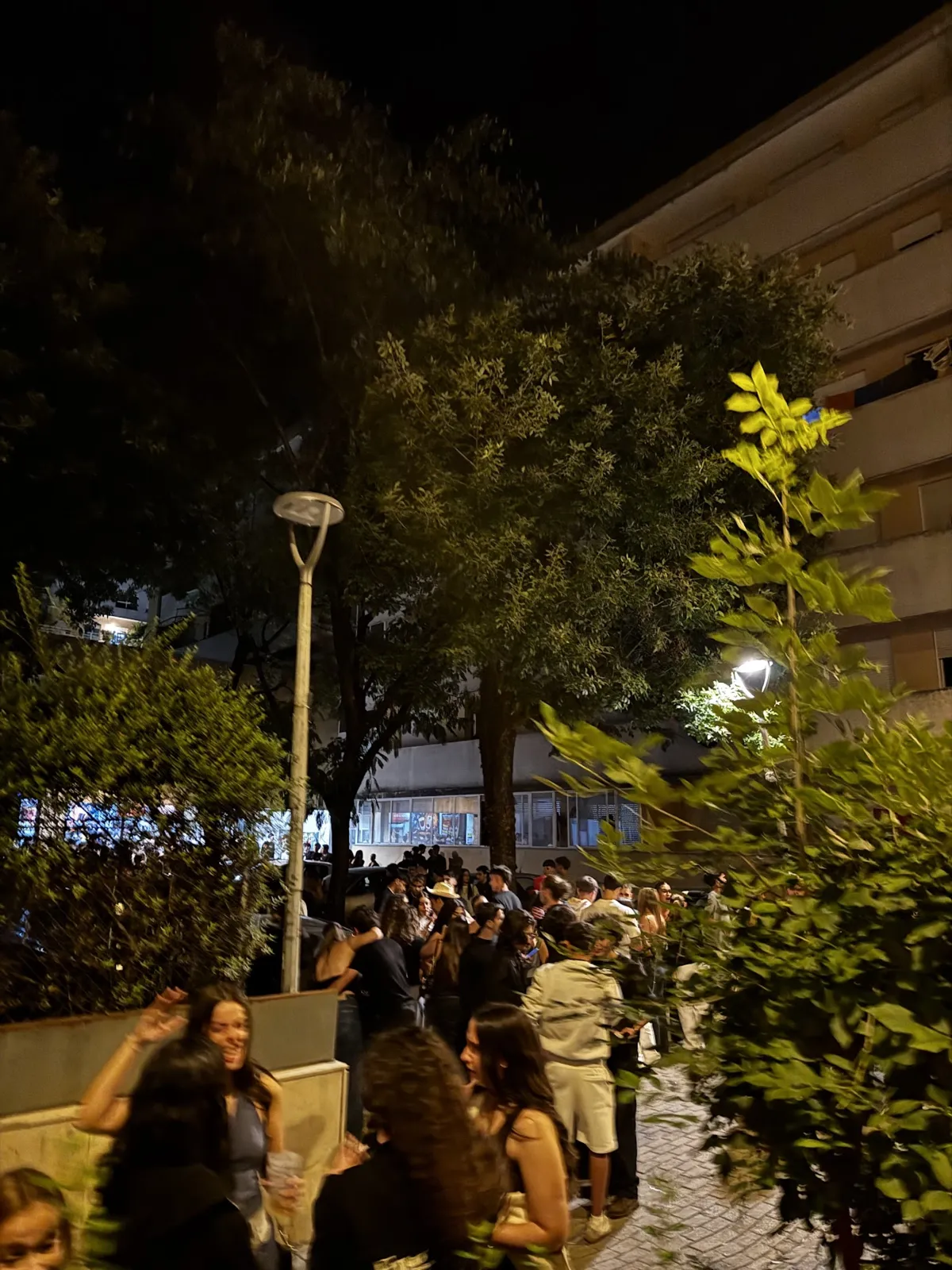 A street in the bar area completely packed with students at night